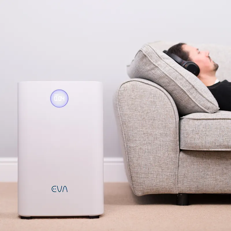 EVA Alto four Air purifier with man on couch